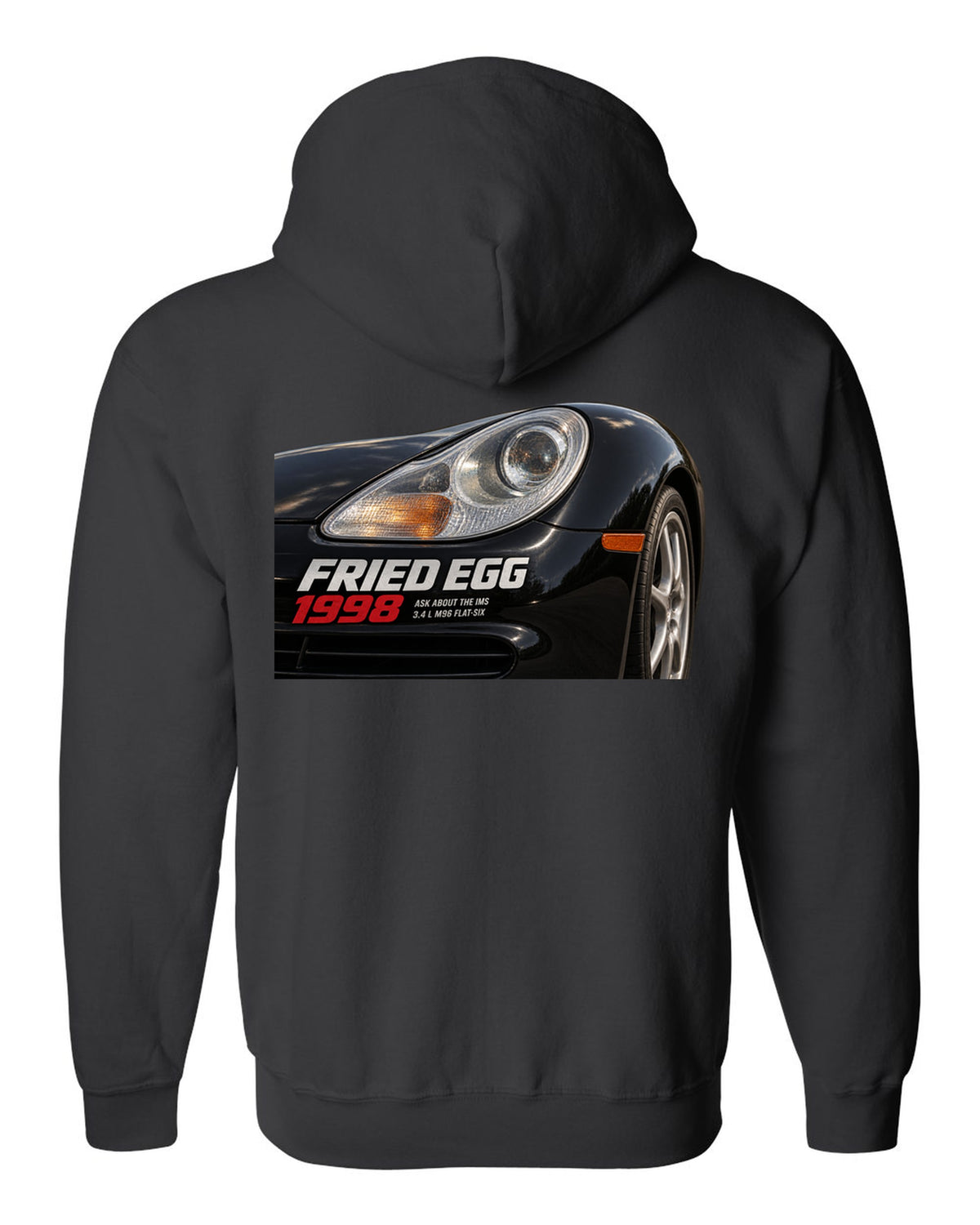 Close-up detail print of the Porsche 911 996 Fried Egg lamp with IMS joke text black zip hoodie back view with the design