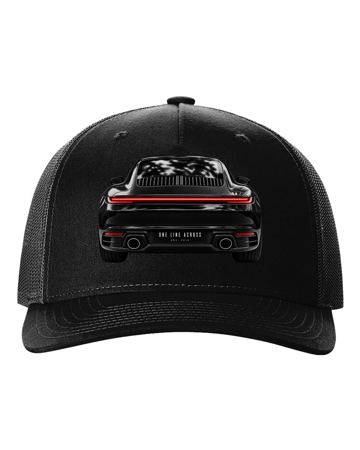 Taillight macro print of a 2019 Porsche 911 Carrera 992 rear light black hat front view with the design