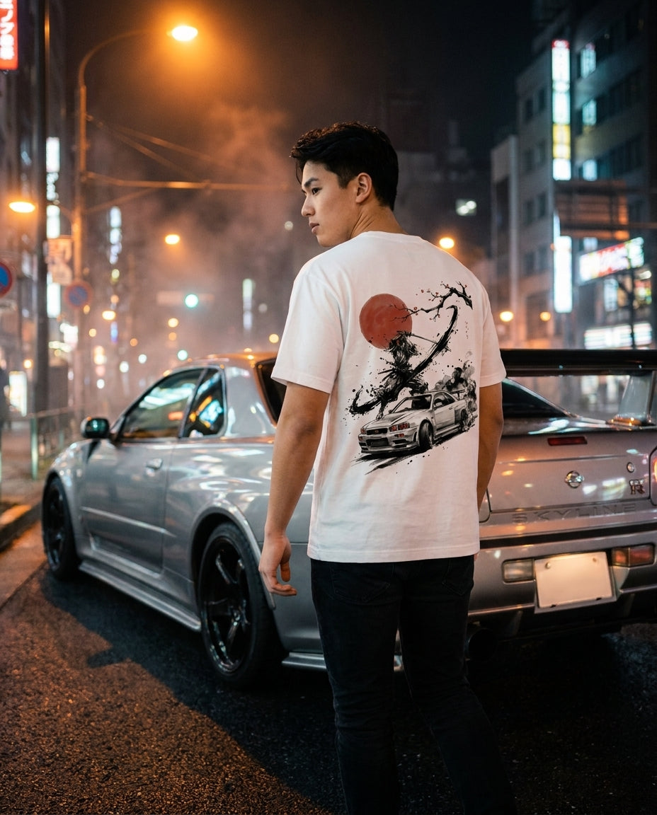 Slash R34 GT-R sumi ink tee worn on a Tokyo street at night