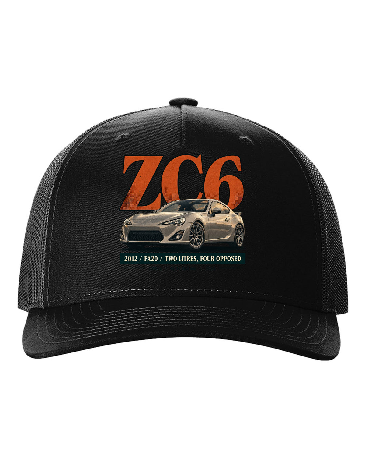 Magazine-style headline layout of a first-generation Subaru BRZ ZC6 print black hat front view with the design