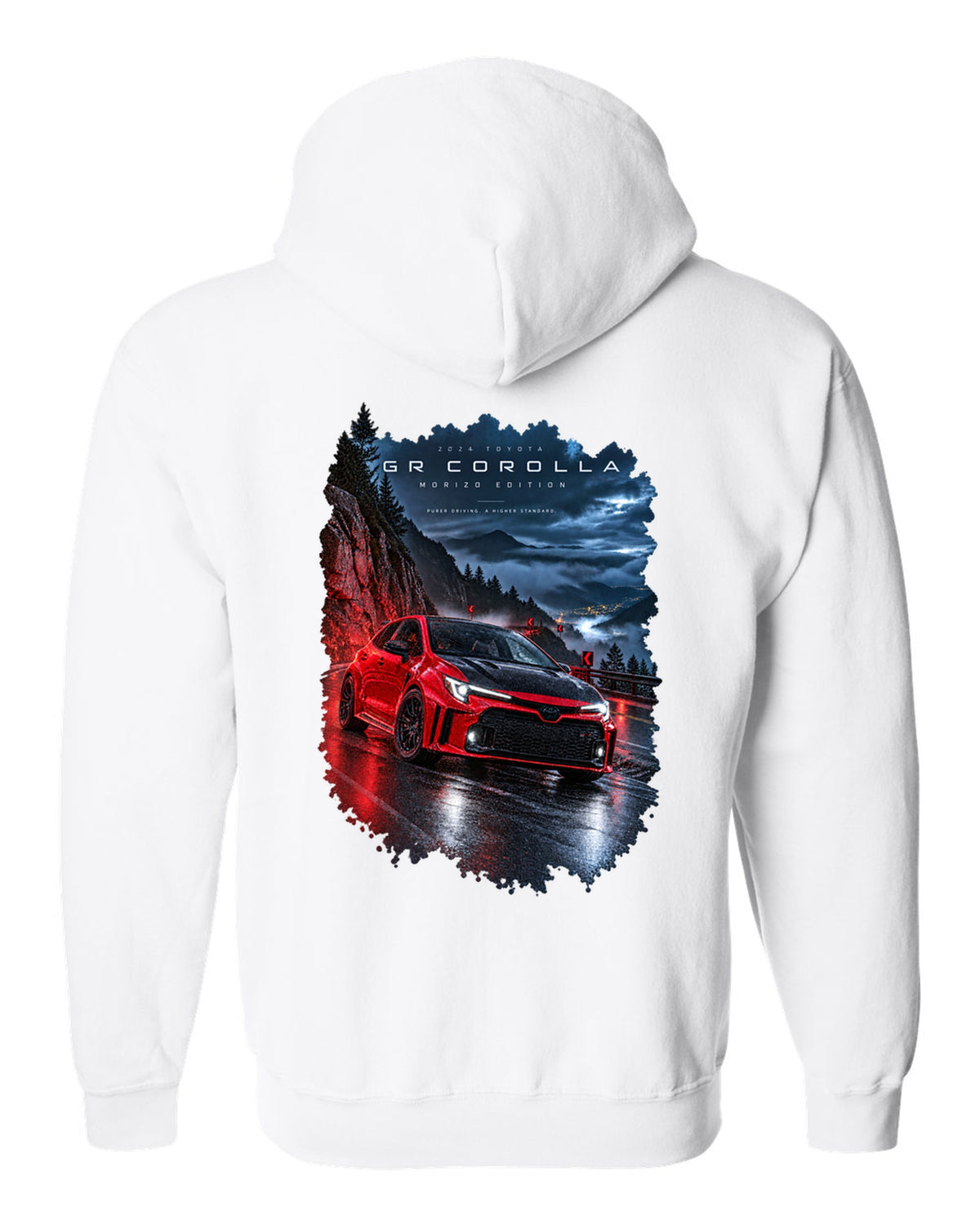 Toyota GR Corolla Morizo Edition on a wet mountain road at night white zip hoodie back view with the design
