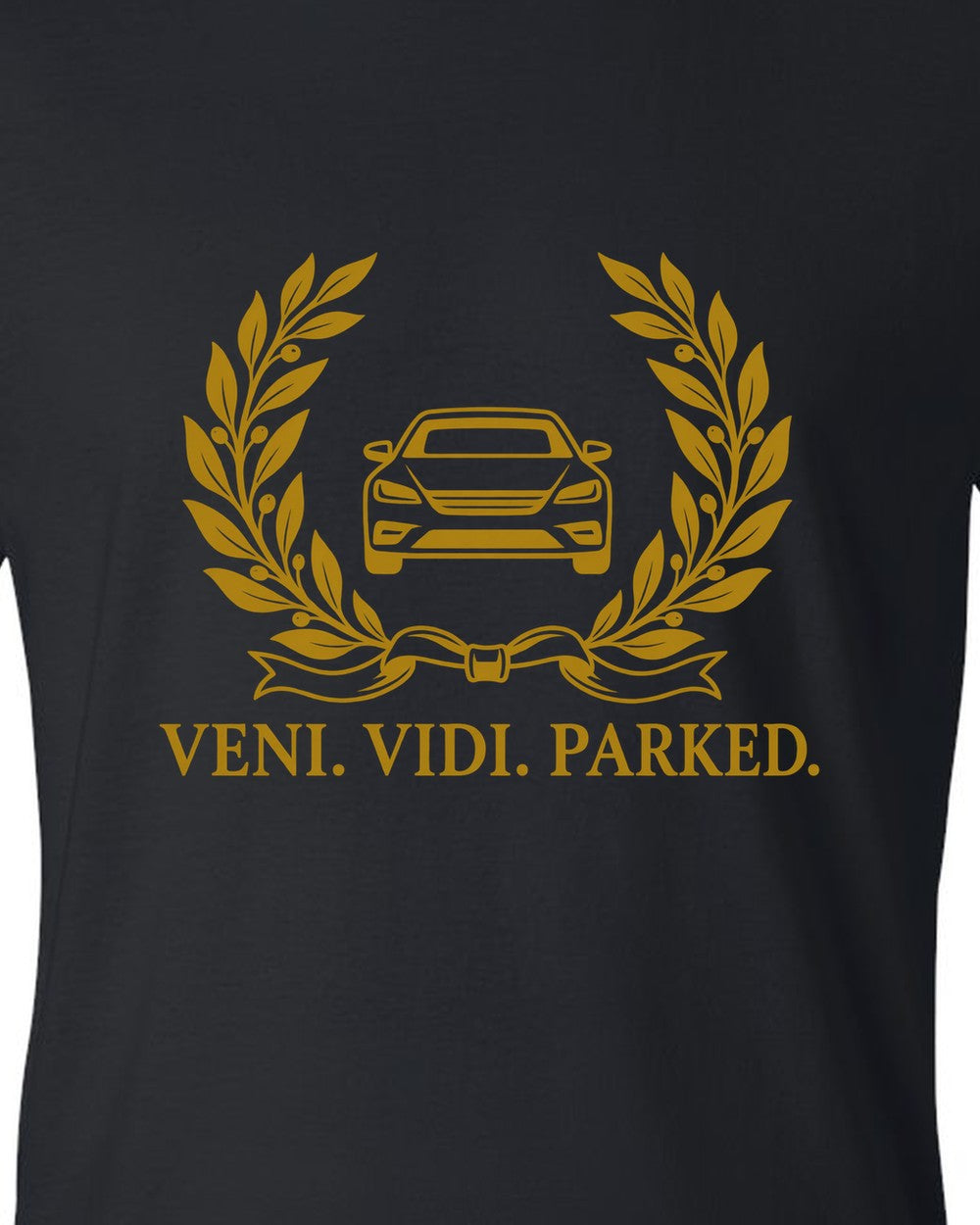 Olive branches and ribbon around a tiny front-view car black t-shirt close-up
